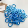 Detailed view of seamless high-elastic hair ties in gradient blue shades with soft texture - Blue