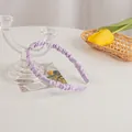 Detail of lavender pleated satin headband with smooth inner frame and protective ends - Taro Purple