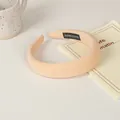 Macro shot of apricot sponge headband with handmade label on minimalist home background - 19# Thick Sponge Style