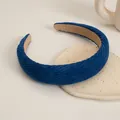 Detailed close-up of dark blue corduroy padded headband with soft non-slip velvet lining - Klein Blue