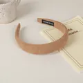 Detail of camel brown padded headband with handmade label on minimalist lifestyle background - 8# Suede Sponge Style