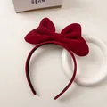 Detail of red velvet bow headband with premium soft texture on a minimal background - Burgundy