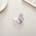 Sparkling purple resin butterfly hair clip with iridescent finish and metal fastener - Amethyst