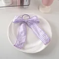 Dettaglio dell'elastico per capelli con fiocco a quadretti viola e nastri lunghi - Elastico Per Capelli In Nastro N. 35 - Viola
