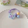 Detail of sweet floral hair tie with blue butterfly charm and pastel matte beads - Purple Butterfly