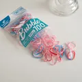 Close-up of MSMP candy-colored elastic hair bands in 25mm size with PU material - Light Pink and Blue