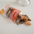Detail of 100pcs high elastic candy color hair bands in transparent hanging packaging - Yellow-Coffee Series