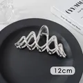 Detail showing the 12cm silver metal hair claw clip with its wave design and metallic spring - Wave (10#)