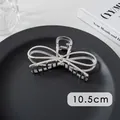 Macro shot of 10.5cm silver bow-knot metal hair claw clip with glossy finish - Bowknot (27#)