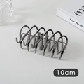 Detail view of 10cm large gunmetal hair claw clip with U-shaped hollow design - Fence Style (8#)