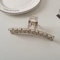 Detail of transparent grey hair claw clip showing sturdy teeth and metal spring - Large Bar Style (5#)