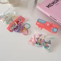 Detail of macaron color hair ties in MSMP branded clear pouch with 35 pieces - 35 Pieces Set / 1# Macaron Series