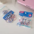Dettaglio degli elastici per capelli MSMP colorati in confezione trasparente da 35 pezzi - 2# Serie Blu Rosa