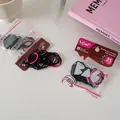 Macro detail of high-elastic hair ties in black and pink with MSMP zipper packaging - 35 Pieces Set / 3# Blackberry Series