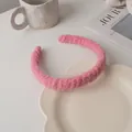 Close-up of pink plush headband texture on a decorative petal tray with a cozy aesthetic - Rose Pink