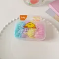 Bunte Kinder-Haargummis Set in Box mit Pastellblau, Violett, Gelb und Rosa - Makrone