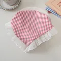 Detailed view of red and white plaid bandana with delicate white ruffled lace trim - Pink Gingham