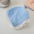 Detail of blue and white checkered fabric headband with wide pleated white lace edge - Blue Plaid