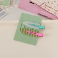 Detail of 2-piece macaron creaseless hair clips set on a mint green display card - Checkerboard and Stripe Style (5# Sea Salt Avocado)