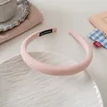 Detail of pink padded sponge headband with handmade label on white ceramic plate - 4# Pink