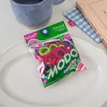 Detail of colorful baby size elastic hair ties in MODO cereal box packaging - Mixed Multicolor (Hot Pink, Green, Purple)