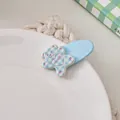 Close-up of blue checkered bear hair clip on white porcelain plate with sweet girl aesthetic - Light Blue