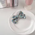 Fermaglio per capelli con fiocco floreale azzurro e trama in tessuto morbido elegante - Tessuto N. 10 - Floreale Blu E Bianco