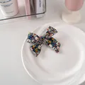 Fermaglio per capelli a fiocco blu navy con motivo floreale su piatto di ceramica - Tessuto N. 12 - Fantasia Floreale Scura