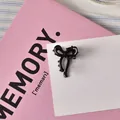 Mini pinza de pelo con lazo negro, accesorio elegante y brillante para flequillo lateral - Negro