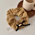 Elastico in velluto a coste marrone con cuori, fiocco in velluto nero e fibbia d'oro - Grande / Caffè - Elastico