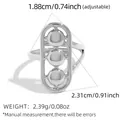 Anillo ajustable plateado con tres cuentas verticales y diseño de marco ovalado - Estilo Todo Plata