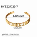 Gold-plated open bangle featuring hollow coin charms and sparkling heart zircon accents - Heart and Coin Style (BYSZ24722-7)