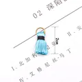 Macro shot of 2cm sky blue fringe tassel with gold metal ring for DIY jewelry making - Lake Blue