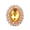 Golden oval brooch with amber gemstone and double rows of sparkling rhinestones - Yellow