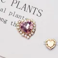 Dettaglio di cristallo a cuore rosa con castone dorato e strass per cucito DIY - Base Oro Rosa