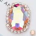 Macro view of oval AB rhinestone in rose gold setting for sewing and DIY accessories - 12*14mm (Main Gem 8*10mm) / Gold Base AB Multicolor