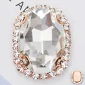 Macro view showing the polished rose gold metal claws and flat base of oval glass rhinestone - 12*14mm (Main Gem 8*10mm) / Gold Base White