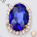 Detailed view of an oval blue glass gemstone with copper base and sewing pins - 12*14mm (Main Gem 8*10mm) / Gold Base Royal Blue