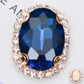 Pierre ovale en verre bleu avec halo de strass et monture en cuivre rose doré - Base Dorée Bleu Paon