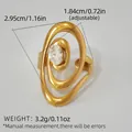 Detailed view of an 18K gold plated flower ring with a large oval zircon centerpiece - Multi Layer Oval Spiral Zirconia Style (A10-4-250519-2)