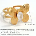Elegant gold butterfly ring with zircons and adjustable band measurement details - White