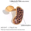 Adjustable golden ring featuring a polished metal surface and leopard print accent - Irregular Double Piece Leopard Style (A13-3-250721-5)