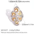 Adjustable dual-tone hollow layered geometric ring with gold and silver finish - Hollow Overlapping Loop Style (A5-2-251010-5)