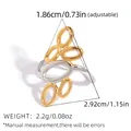 Modern abstract geometric ring with gold and silver interlaced oval loops design - Elliptical 3D Overlap Style (A7-2-251011-6)