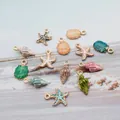 Ocean-themed gold alloy charms with starfish and conch shapes for DIY jewelry making - Colorful