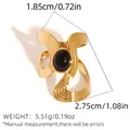 Gouden roestvrijstalen geometrische ring met zwarte ovale steen en golftextuur - Goud met Zwarte Agaat (BJZ-251111-7)