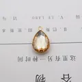 Champagne teardrop crystal pendant in gold frame for DIY jewelry and hair accessories - Champagne