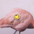 Round yellow rhinestone ornament with silver base on pink flamingo feather - 13mm / Yellow