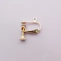 Dettaglio del convertitore per orecchini a vite dorato per la creazione di gioielli - oro kc