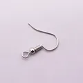 Close-up of shiny silver earring hooks with spiral coils and bead details for DIY jewelry - White K/Silver